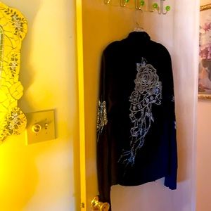 Black and silver top.  Type sweater